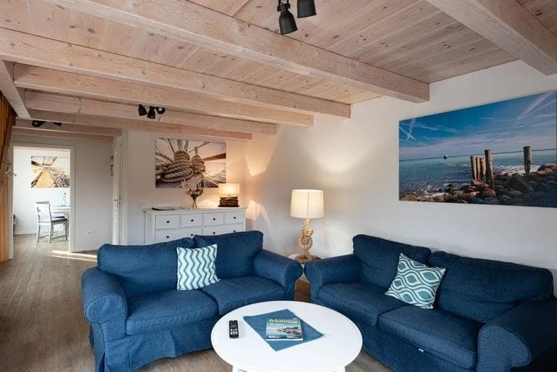 Wohnzimmer eines Ferienhauses im Hus Seeblick